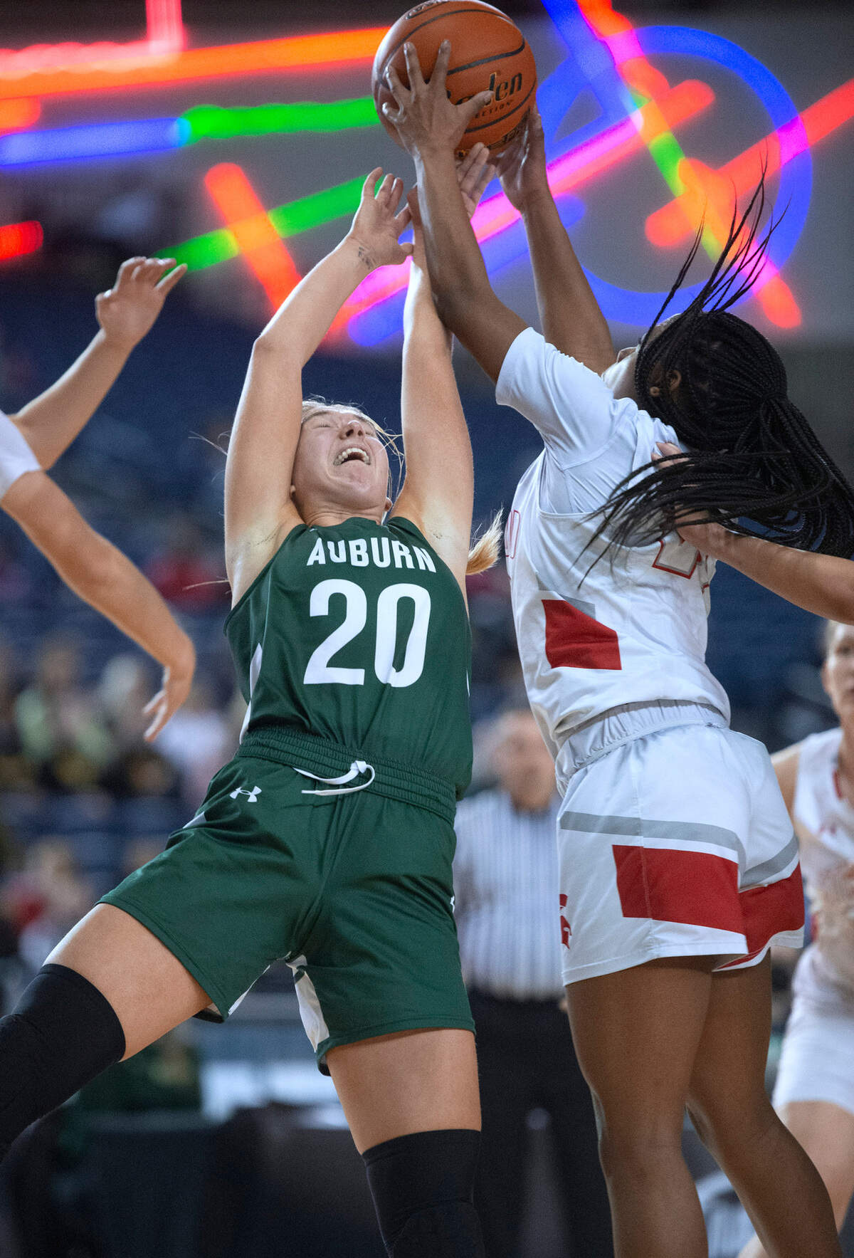Auburn’s Chloe Furnstahl battles Stanwood’s Chloe Santeford for a rebound during Wednesday afternoon’s opening-round game of the WIAA 3A Girls Basketball State Championships tournament in the Tacoma Dome in Tacoma, Washington, on Wednesday, March 2, 2022. Auburn lost to Stanwood, 53-39.