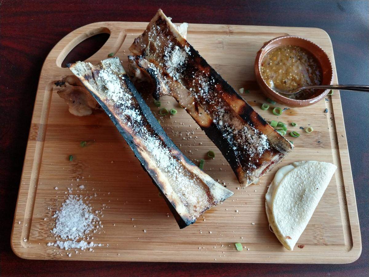 Roasted bone marrow is one of the appetizers at Ta Carbon.