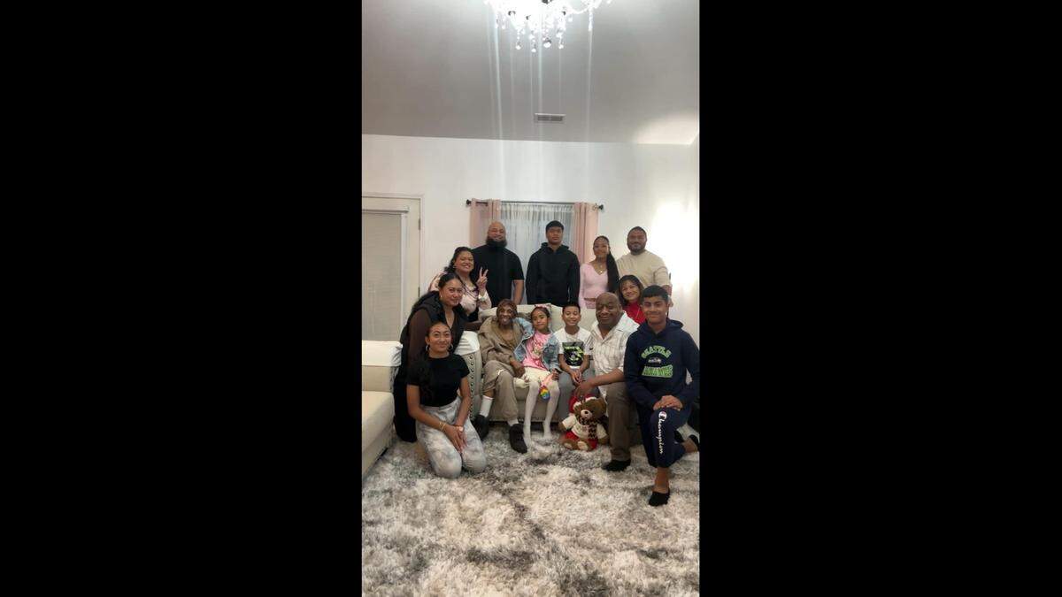Merion Jean Jones (far left on couch) is pictured with family members and relatives at her son’s house in Puyallup on Christmas Day 2024. Jones died three days after the vehicle she was a passenger in was struck by a suspected drunk driver later that night.