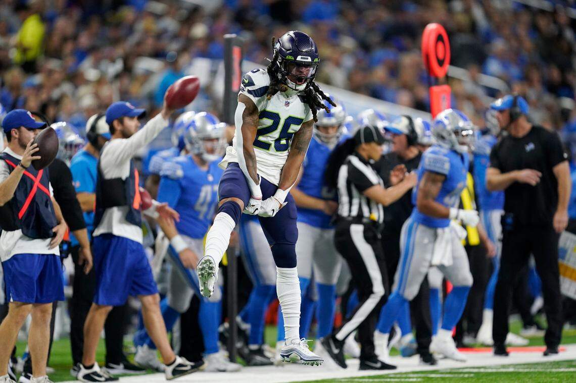 Seattle Seahawks safety Ryan Neal reacts after a play during the first half of an NFL football game against the Detroit Lions, Sunday, Oct. 2, 2022, in Detroit. (AP Photo/Paul Sancya)