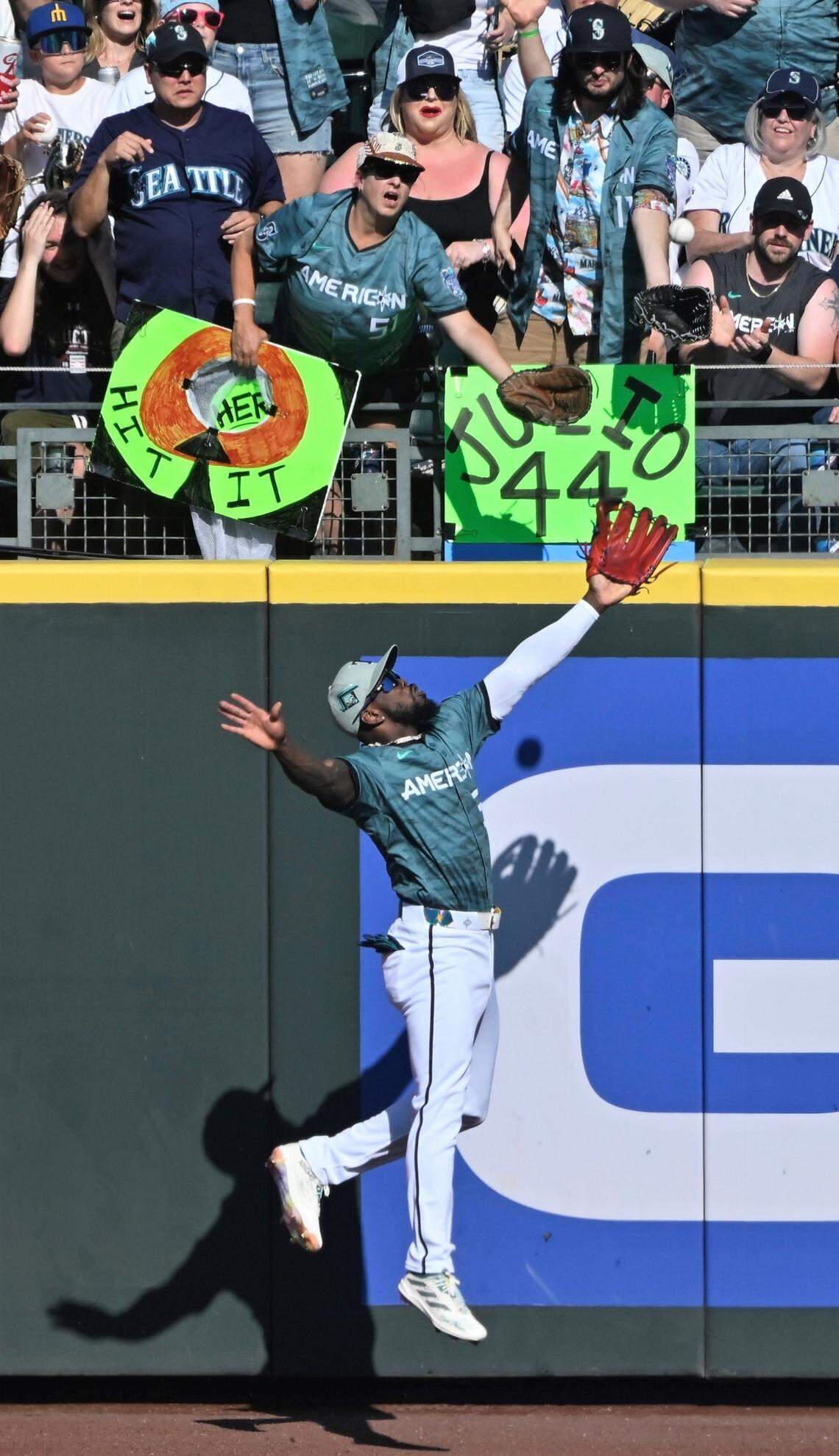 Tampa Bay’s Randy Arozarena makes a leaping catch at the fence in left on a long fly from Freddie Freeman in the top of the first inning in the 2023 MLB All-Star Game at T-Mobile Park on Tuesday, July 11, 2023.