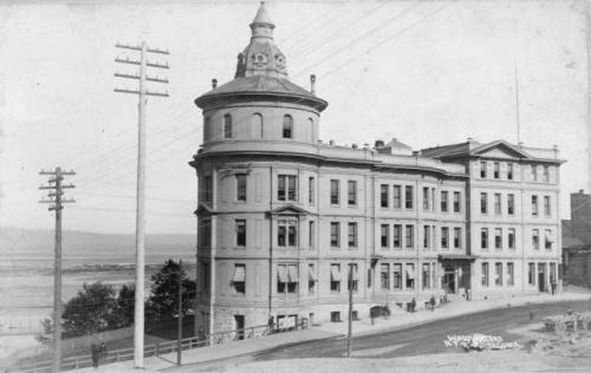 Northern Pacific Headquarters at 621 Pacific Ave., circa 1889. The railroad chose Tacoma as its western terminus in 1873; from that point, the city would grow from a small hamlet to a metropolis of about 30,000 by 1890. Its 53 offices and storerooms and 19 vaults were utilized by the Tacoma Land Company, Weyerhaeuser Company and Northern Pacific. Northern Pacific would sell the building to the city in 1922.