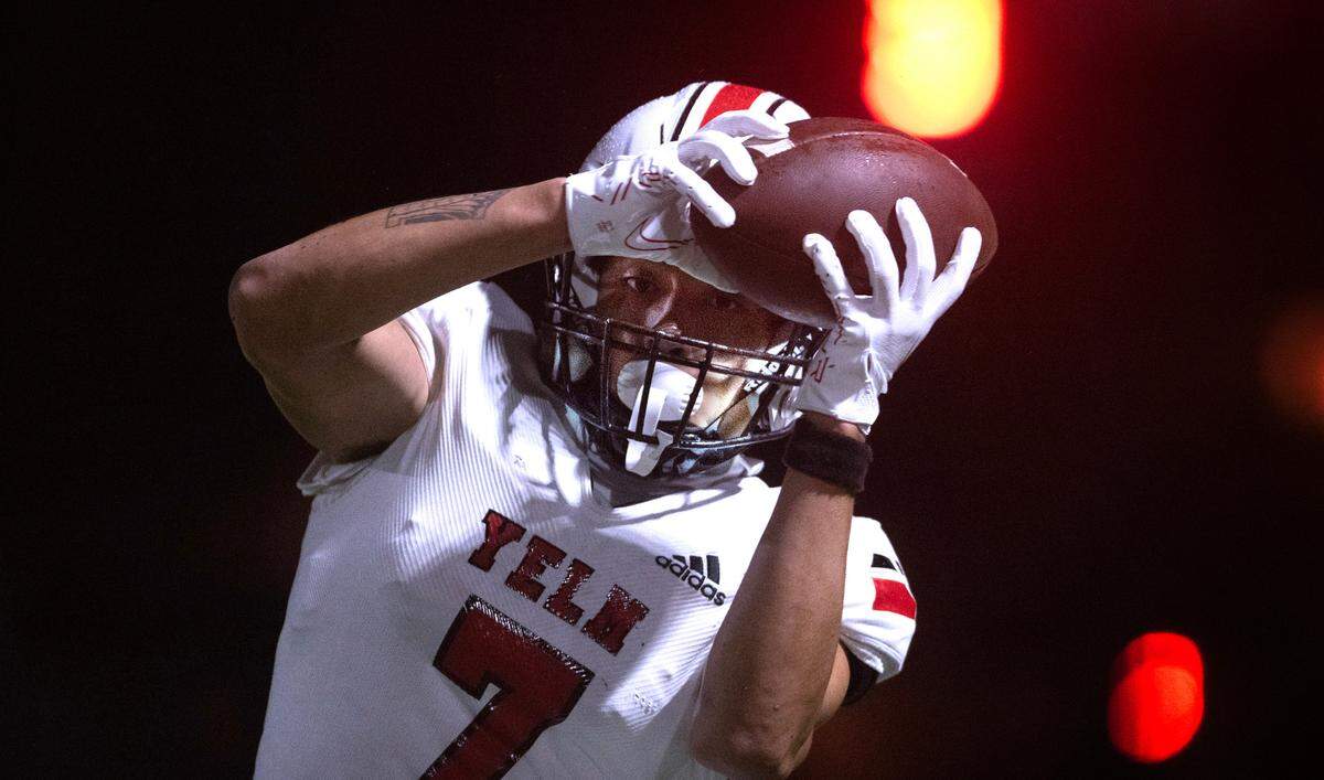 Yelm wide receiver Marius Aalona pulls down a pass in the end zone for a two-point conversion during Friday night’s 3A SSC football game against the Timberline Blazers at South Sound Stadium in Lacey, Washington, on Oct. 13, 2023. Yelm won the game, 54-7.