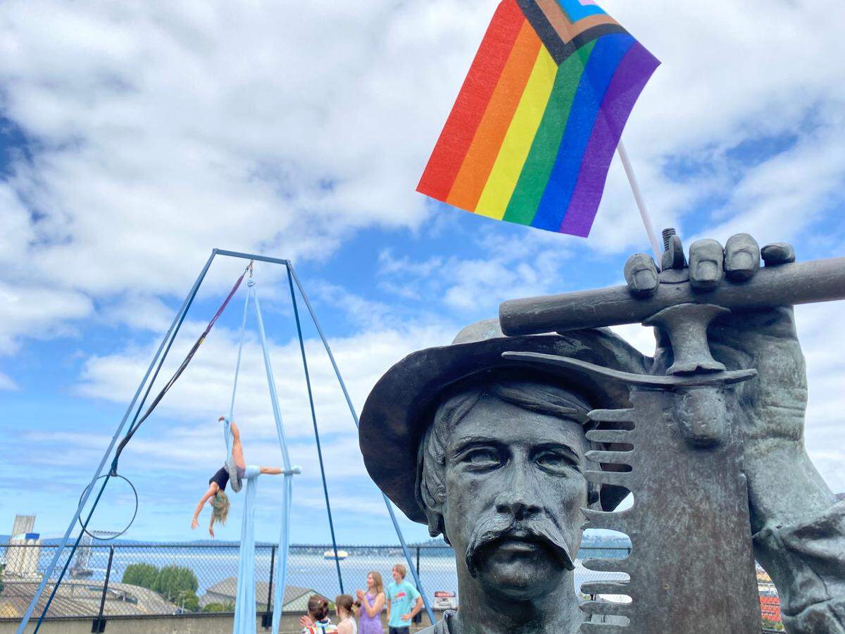 Olive-James Lebens, 11, of Olympia performs aerial art at the Tacoma Pride celebration on Saturday, July 8, 2023.