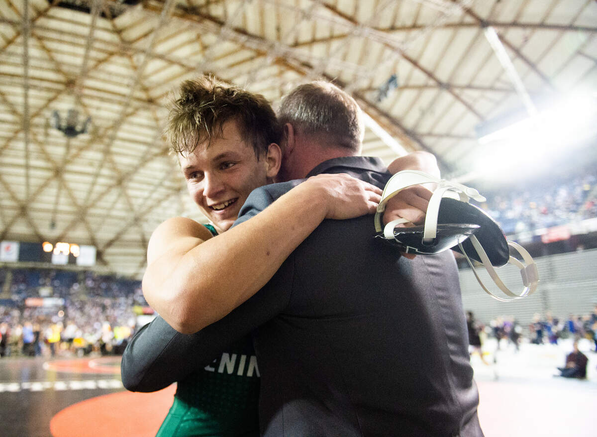 Peninsula’s Nola Casey celebrates winning the 3A 160 pound championship during day two of Mat Classic XXXII at the Tacoma Dome in Tacoma, Wash., on Saturday, Feb. 22, 2020.