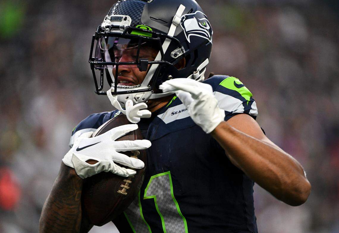 Seattle Seahawks wide receiver Jaxon Smith-Njigba (11) hauls in a big reception during the second quarter of the preseason game against the Dallas Cowboys at Lumen Field, Saturday, Aug. 19, 2023, in Seattle, Wash.