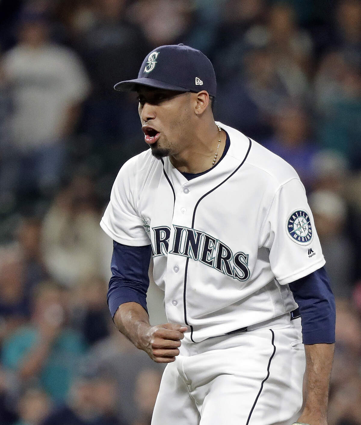 Seattle Mariners closing pitcher Edwin Diaz reacts to his strikeout against the Baltimore Orioles in the ninth inning to end a baseball game Monday, Sept. 3, 2018, in Seattle. The Mariners won 2-1. (AP Photo/Elaine Thompson)