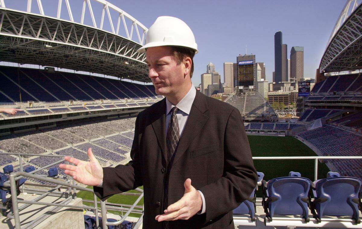 Seattle Seahawks team president Bob Whitsitt speaks with reporters from the upper level of the south end of the team’s new stadium Thursday, May 16, 2002, in Seattle.