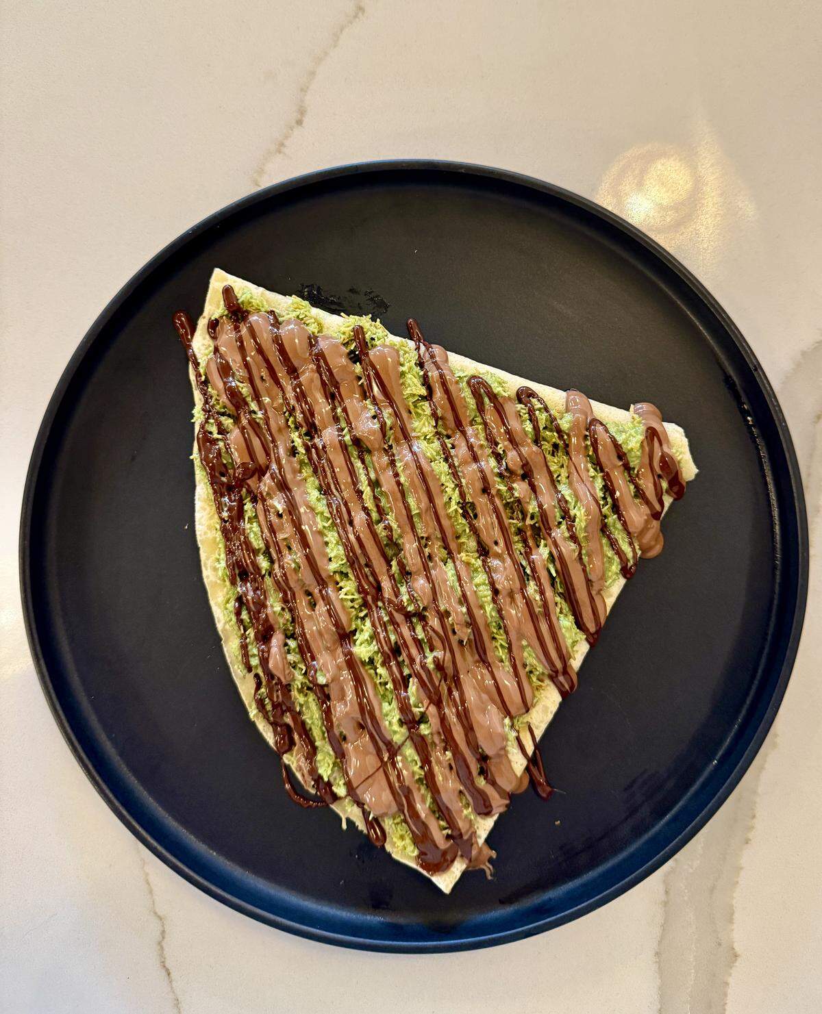 Lune Cafe opened in August at 1916 Pacific Ave. in downtown Tacoma and added the drive-thru-only Lune To-Go in Lakewood in September. The coffee and dessert shop specializes in Dubai chocolate-inspired treats like this crêpe.