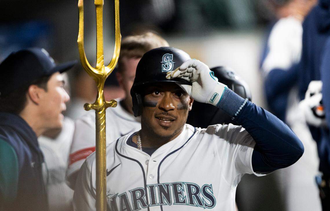Seattle Mariners third baseman Jorge Polanco (7) celebrates his home run against the Oakland Athletics during the eighth inning of the opening day game at T-Mobile Park, on Thursday, March 27, 2025, in Seattle, Wash.