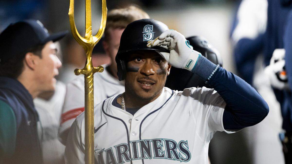 Seattle Mariners second base Jorge Polanco (7) celebrates his home run against the Oakland Athletics during the eighth inning of the opening day game at T-Mobile Park, on Thursday, March 27, 2025, in Seattle, Wash.