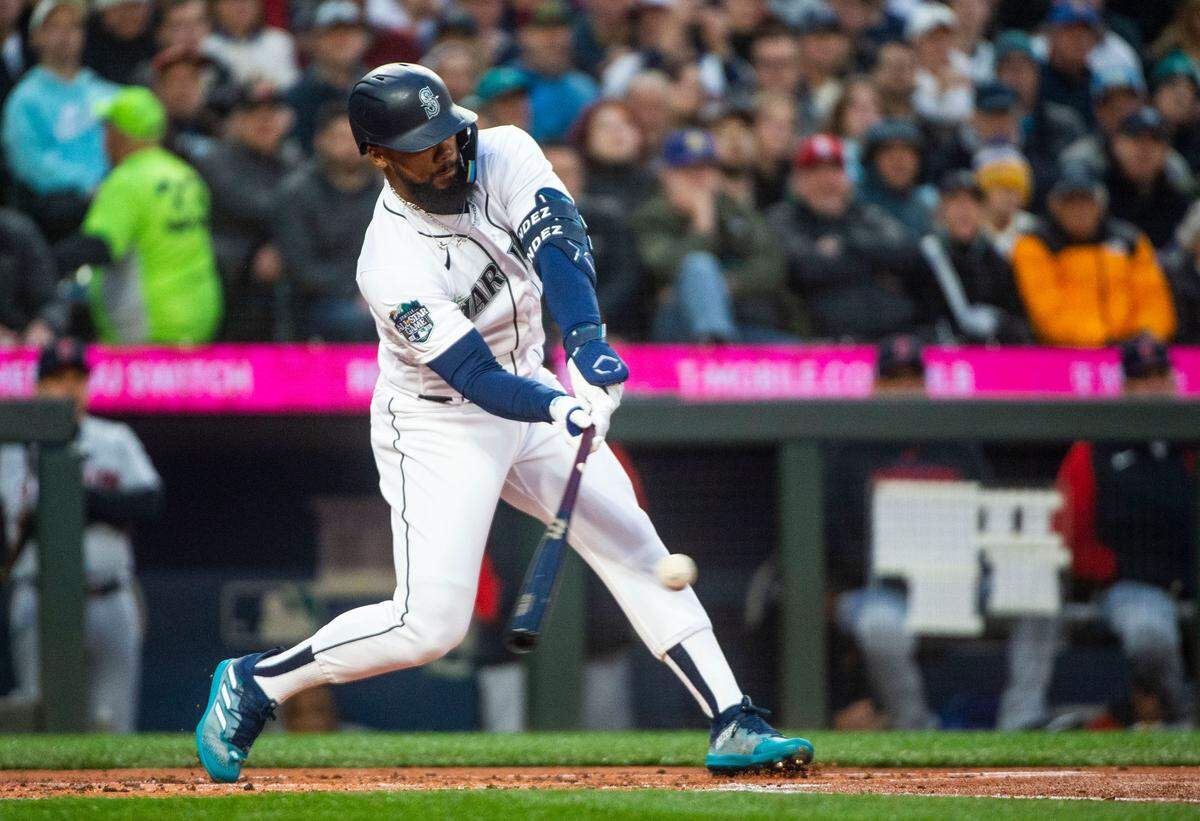 Seattle Mariners right fielder Teoscar Hernandez (35) bats during the first inning of the Mariners home opener against the Cleveland Guardians at T-Mobile Park in Seattle on Thursday, March 30, 2023.