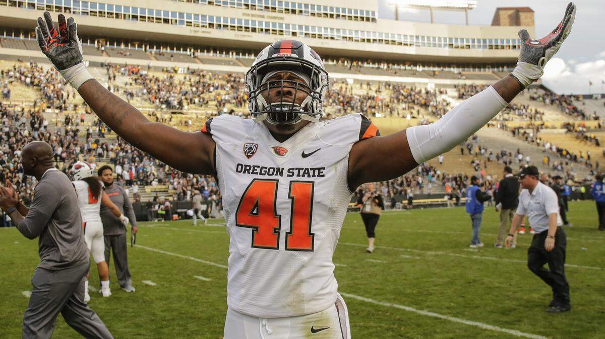 Oregon State linebacker Shemar Smith celebrates a win against Colorado following an NCAA college football game, Saturday, Oct. 27, 2018, in Boulder, Colo. (AP Photo/Jack Dempsey)