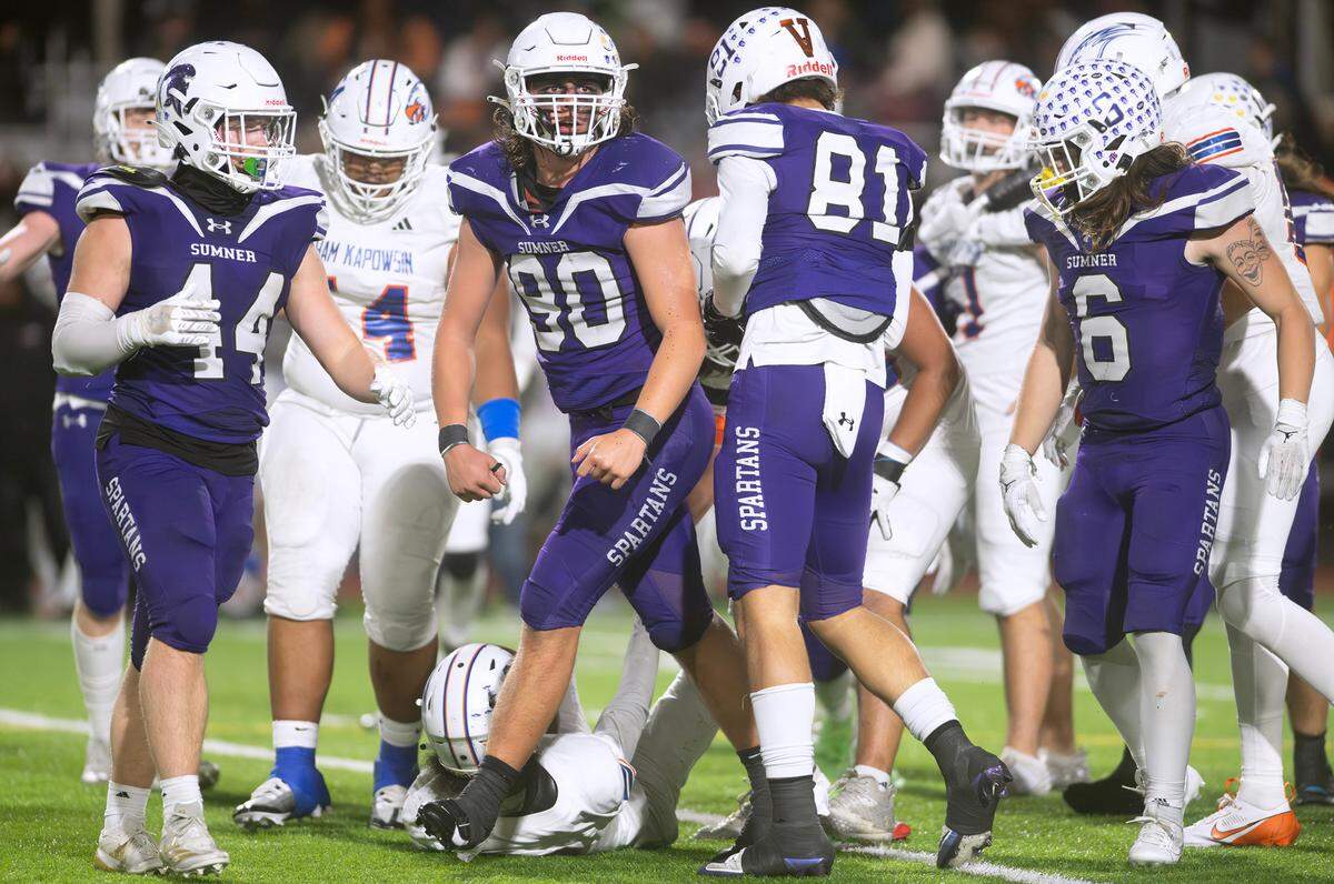 Sumner defensive end Shaun Griffith celebrates a tackle for a loss during Friday night’s football game against the Graham Kapowsin Eagles at Sunset Chev Stadium in Sumner on Nov. 1, 2024. Sumner won the game, 23-11.