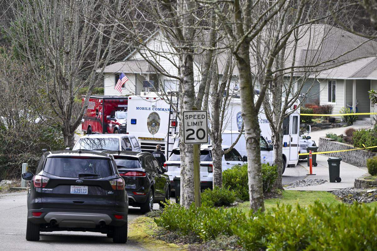Several law enforcement agencies investigate the scene of a multiple stabbing and deputy involved shooting in the Purdy, Wash. area on Tuesday, Feb. 24, 2026.