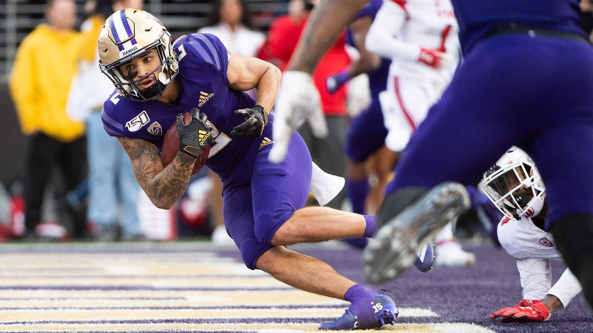 Washington Huskies wide receiver Aaron Fuller (2) scores a touchdown during the fourth quarter of a game against Utah in November at Husky Stadium. The Seahawks signed him to a contract as a rookie free agent.