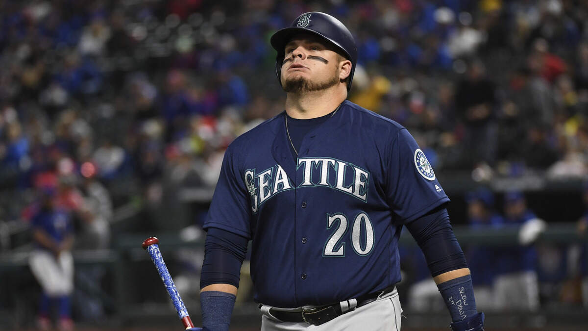 Seattle Mariners' Daniel Vogelbach (20) walks back to the dugout after striking out looking against the Texas Rangers in the third inning of a baseball game, Saturday, April 21, 2018, in Arlington, Texas. (AP Photo/Jeffrey McWhorter)