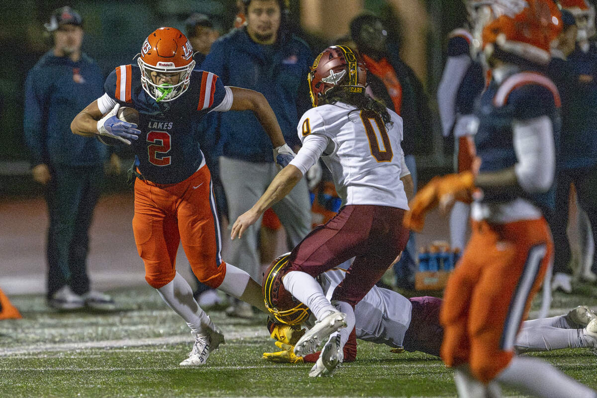 Lakes wide receiver Tristan Baker (2) dodges Capital defenders on Friday, Oct. 24, 2025, in Lakewood, Wash.