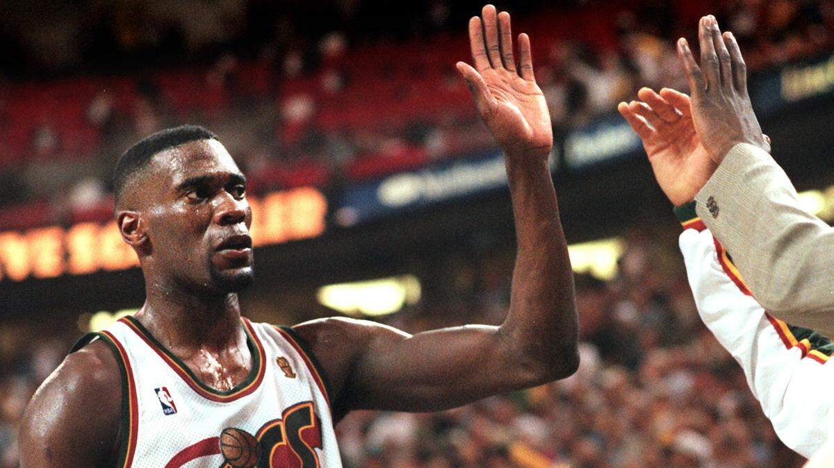 Shawn Kemp, seen here in a 1996 photograph, was arrested in Tacoma on Wednesday for suspicion of drive-by shooting.