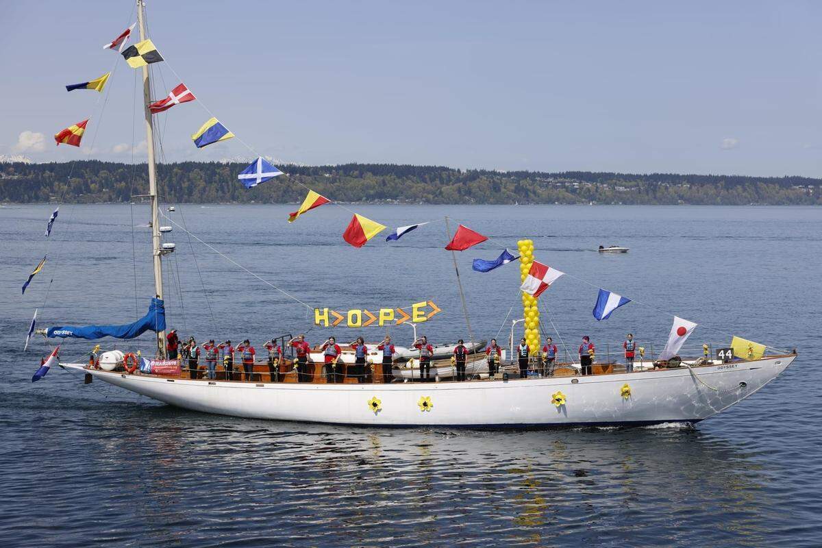 The now-mastless Odyssey motors through Puget Sound in an undated photograph. The sailboat is the signature vessel of one local unit of the youth sailing program Sea Scouts, which has operated in Tacoma since 1923.