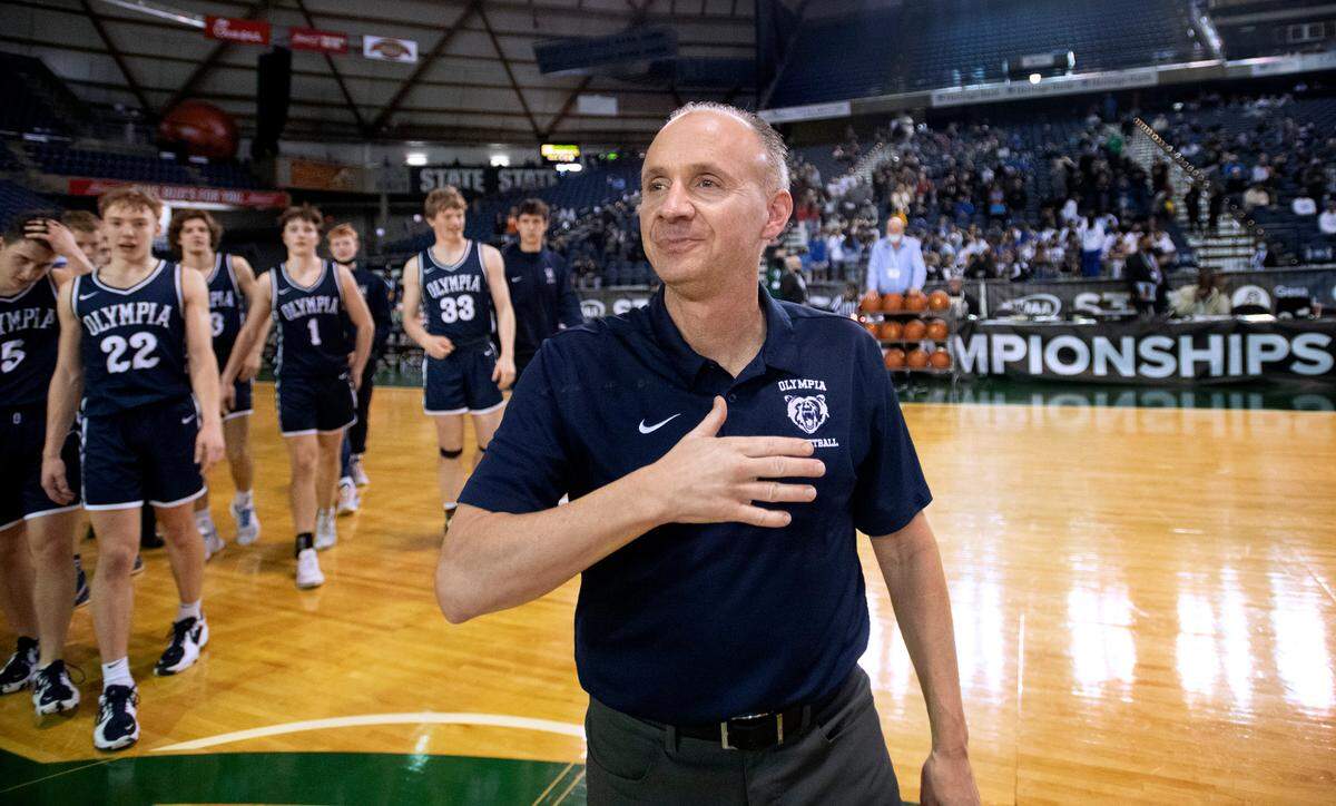 Olympia boys head coach John Kiley thanks the fans following the Bears’ third-place finish in the WIAA 4A Boys Basketball State Championships tournament in the Tacoma Dome in Tacoma, Washington, on Saturday, March 5, 2022.