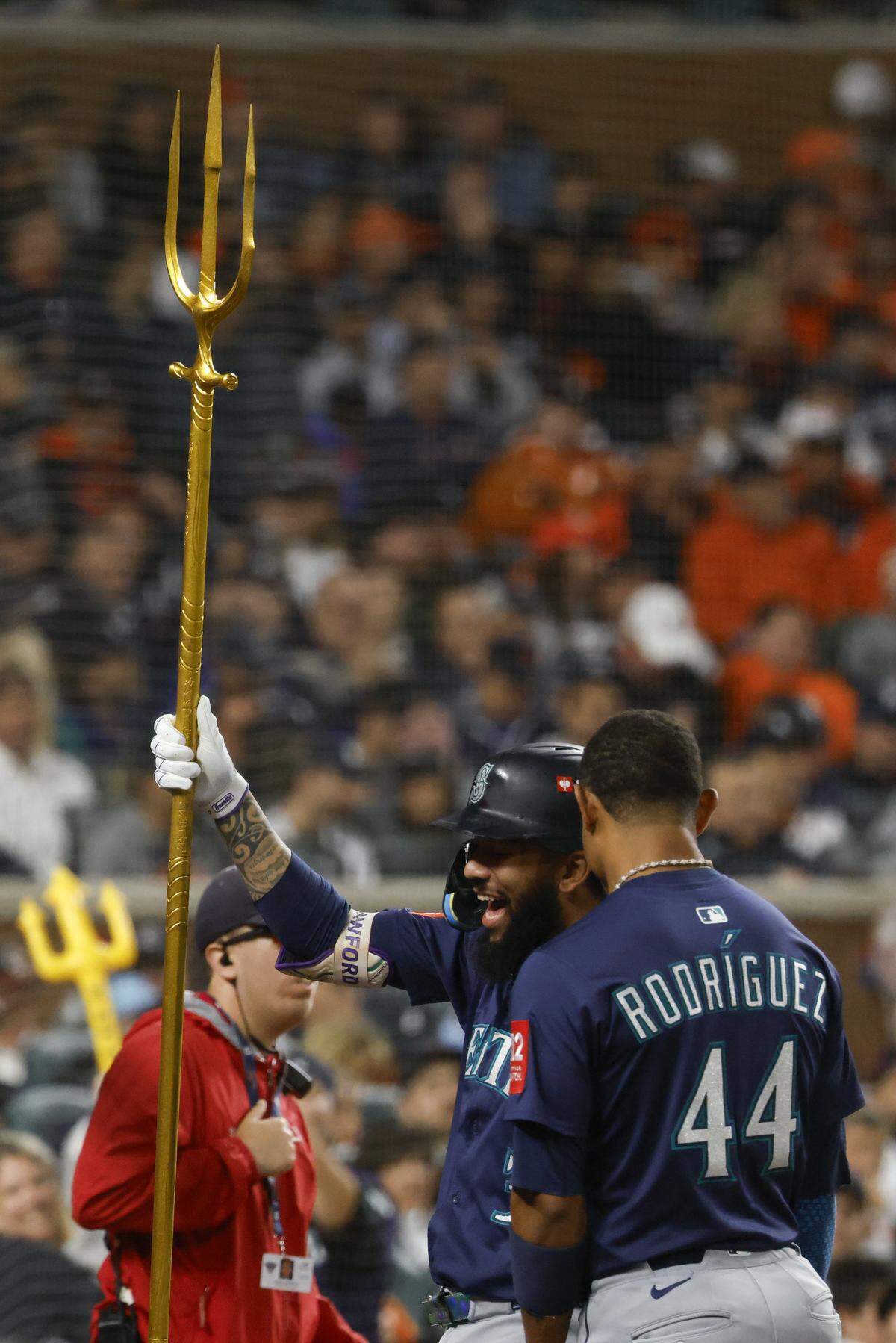 Oct 7, 2025; Detroit, Michigan, USA; Seattle Mariners center fielder Julio Rodríguez (44) and shortstop J.P. Crawford (3) celebrate after Crawford scores a home run in the sixth inning against the Detroit Tigers during game three of the ALDS round for the 2025 MLB playoffs at Comerica Park. Mandatory Credit: Rick Osentoski-Imagn Images