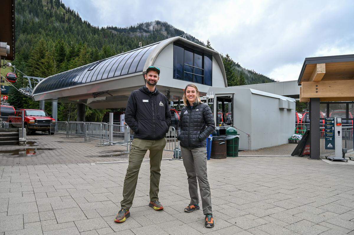 President and COO Linnea Hansen and Communications Manager Rhyan McLaury in front of the Mount Rainier Gondola in May 2026.