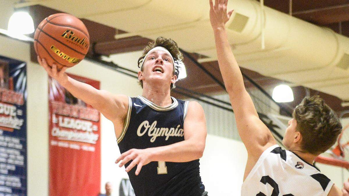 Olympia’s Ethan Gahm shoots during the third quarter. Olympia played Union in a basketball game at Wilson High School in Tacoma, Wash., on Friday, Feb. 14, 2020.