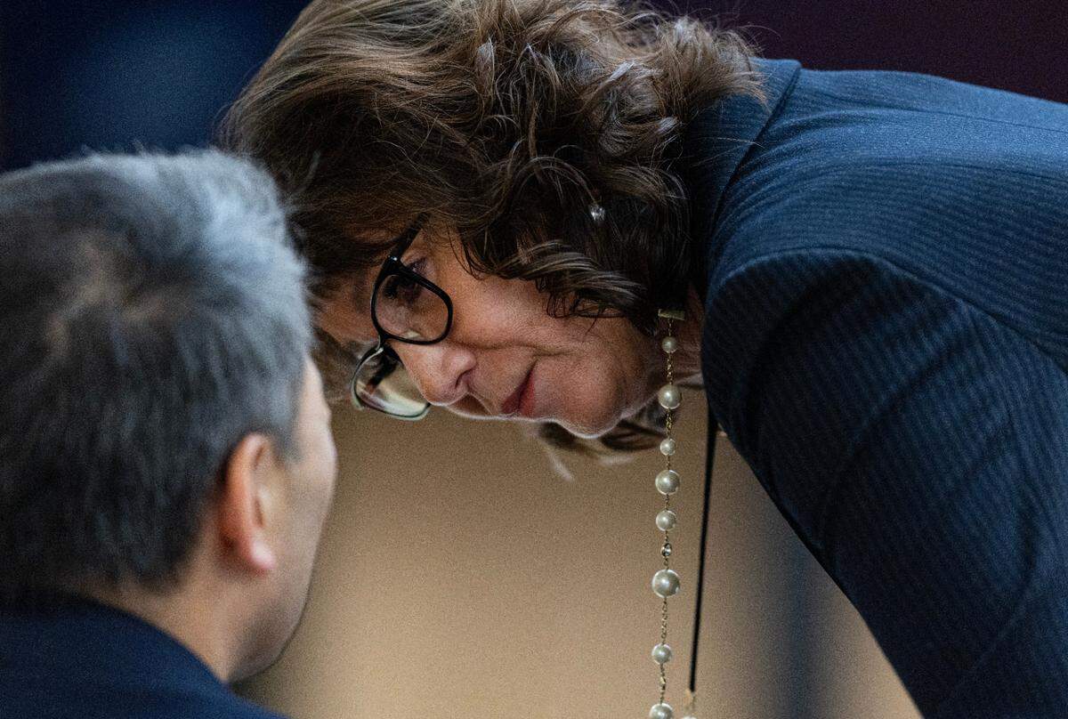 Special Assistant Attorney General Patty Eakes speaks with prosecutor Kent Liu Wednesday, Nov. 1, 2023, at Pierce County Superior Court in Tacoma. (Luke Johnson / Pool / The Seattle Times)