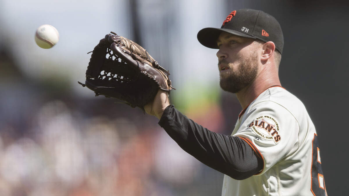 San Francisco Giants relief pitcher Hunter Strickland receives the ball before the pitch against the Los Angeles Dodgers in the third inning of a baseball game in San Francisco, Sunday, Sept. 30, 2018. (AP Photo/John Hefti)