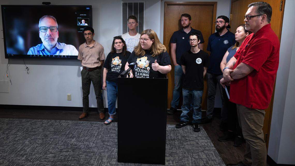 Ann Dorn of Tacoma For All is flanked by Tacoma workers as she speaks at a press conference in University Place, Washington, on Wednesday, Aug. 2, 2023. Tacoma For All filed a lawsuit against the City of Tacoma over the City Council’s addition of an alternative measure to the group’s Tenants Rights Initiative and won that suit on Aug. 30, 2023. Now the organization is alleging several housing and realtor associations violated state law when campaigning against their ballot measure.