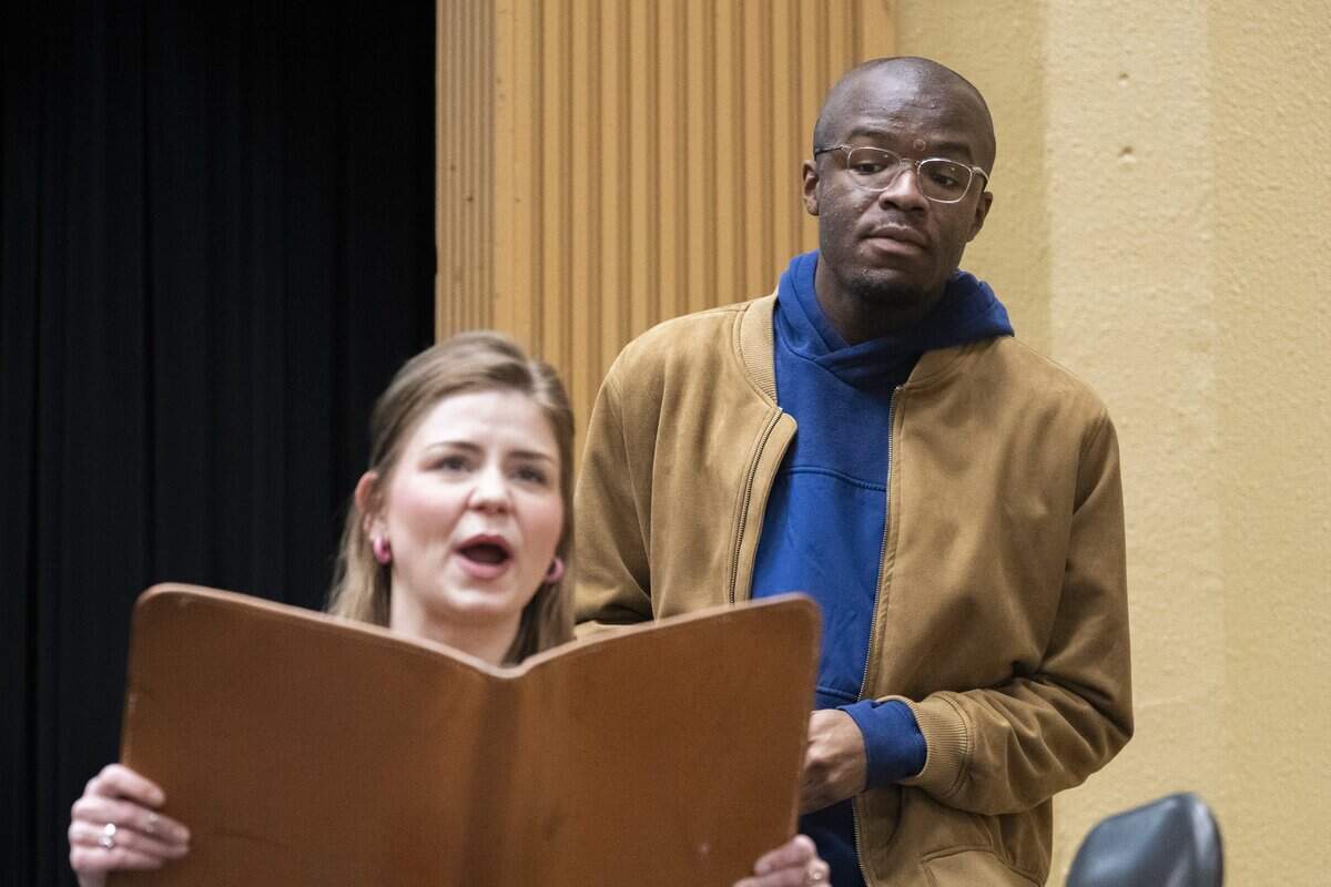Elise Bahnson, left, as Jo March, rehearses a scene in the musical Little Women with Stephen Donaldson, as Professor Bhaer, on Wednesday, June 3, 2026, at Tacoma Community College in Tacoma, Wash. The musical is the first fully-staged production at TCC in more than 30 years.