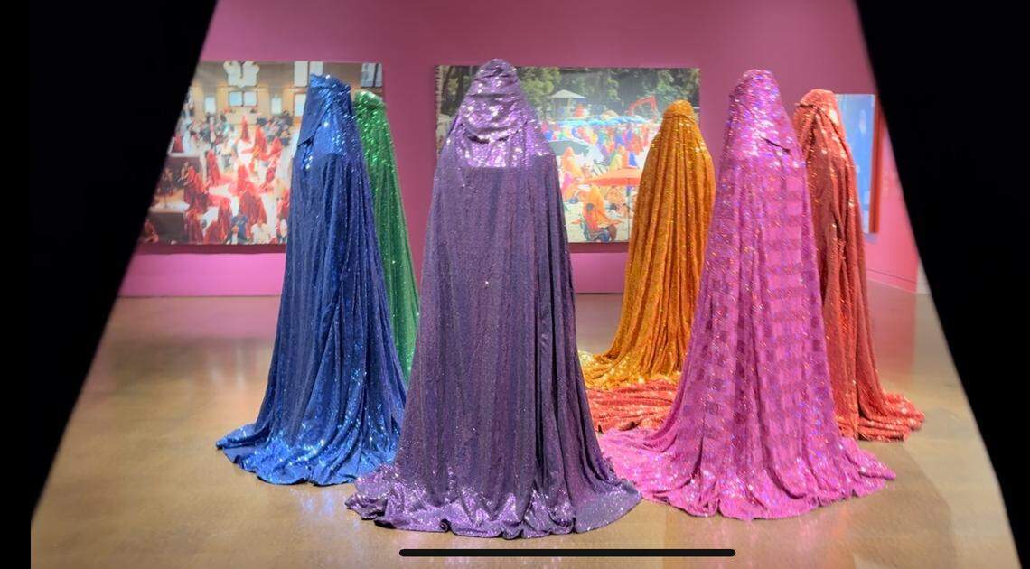 A circle of seven sparkling chadors created by Anida Yoeu Ali in her show at the Seattle Art Museum.