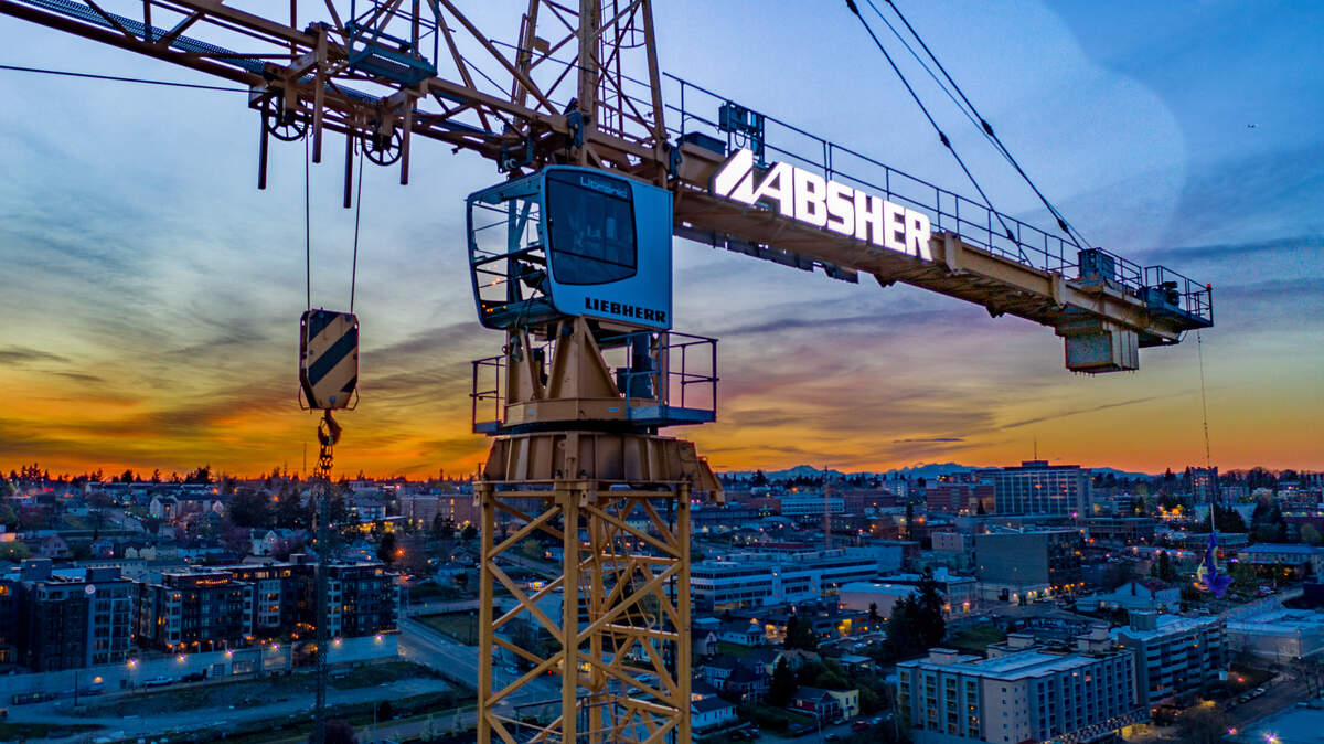 An Absher construction crane seen during the construction of the Marriott Tacoma Downtown hotel. Absher, based in Puyallup, has announced its transition to an employee stock ownership plan of the company after decades operating as family-owned operation.