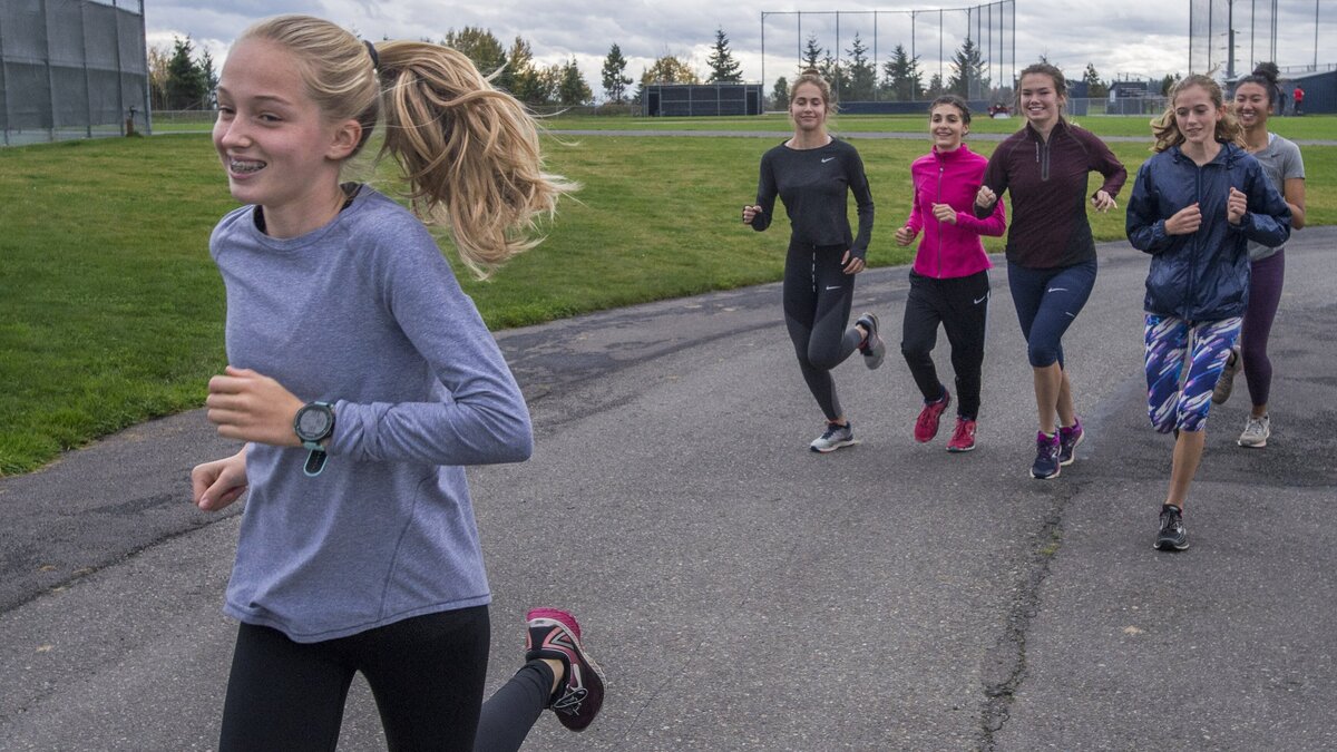The Bellarmine Prep High School girls cross country team warms up with freshman phenom Ella Borsheim in the lead on Thursday, Nov. 1, 2018.