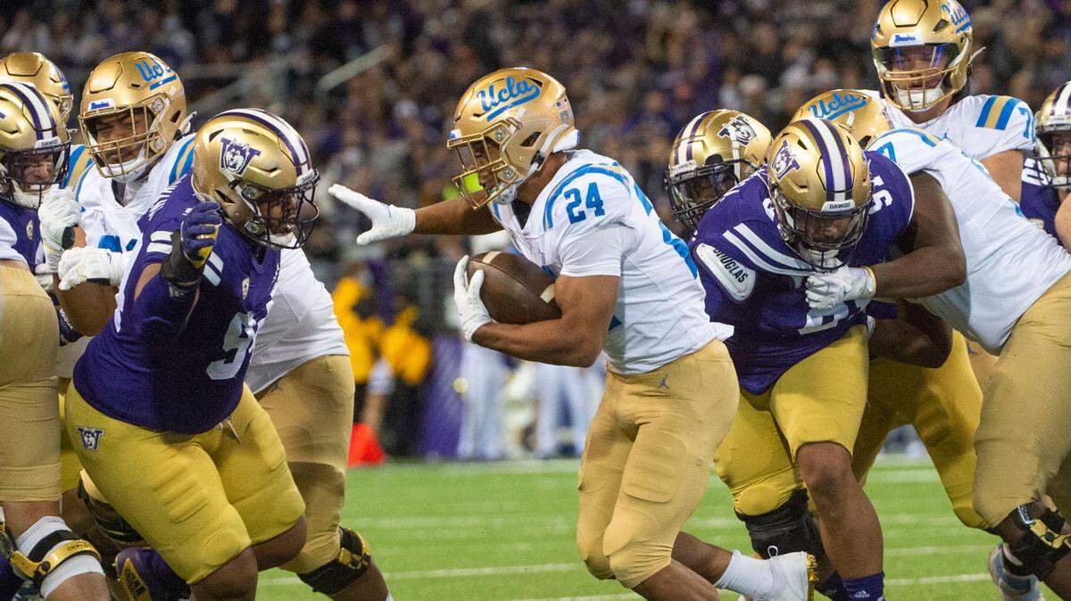 Bruins running back Zach Charbonnet led his team in rushing with 131 yards during an NCAA college football game between Washington and UCLA Saturday, Oct. 16, 2021, in Seattle.