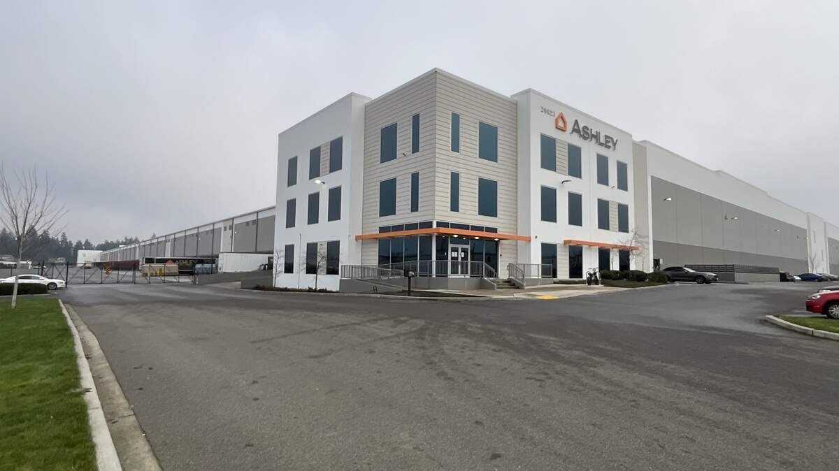 The Ashley Furniture Industries megawarehouse, 20623 34th Ave. E., Spanaway, has sold for close to $200 million to Amazon.com Services LLC, along with two adjacent parcels for $21.7 million in a separate transaction.