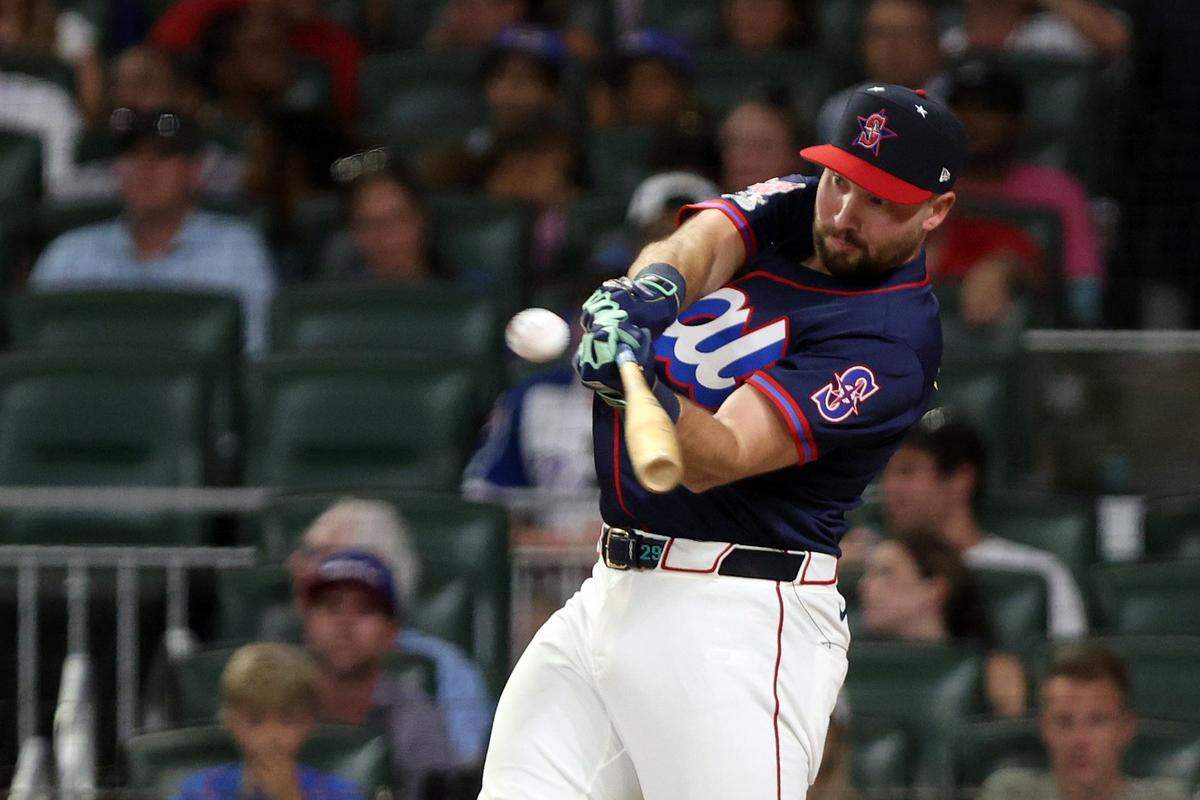 Jul 14, 2025; Atlanta, GA, USA; Seattle Mariners catcher Cal Raleigh (29) bats during the 2025 Home Run Derby at Truist Park. Mandatory Credit: Jordan Godfree-Imagn Images