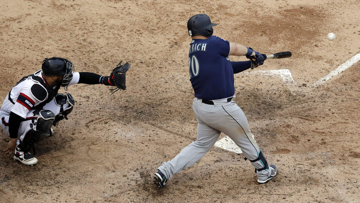 Seattle Mariners’ Daniel Vogelbach hits a solo home run against the Chicago White Sox during the ninth inning of a baseball game in Chicago, Sunday, April 7, 2019. The Mariners won 12-5. (AP Photo/Nam Y. Huh)