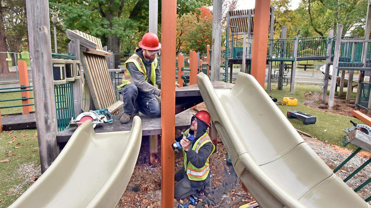 Parks Tacoma employees perform repairs to the Wright Park playground, which reopened in December 2025 following a months-long closure.