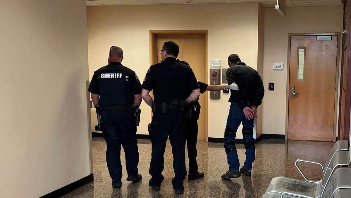 Pierce County sheriff’s deputies serve an arrest warrant from Grays Harbor County on Michael Joseph Basse at the County-City Building in Tacoma on Thursday, May 25, 2023.