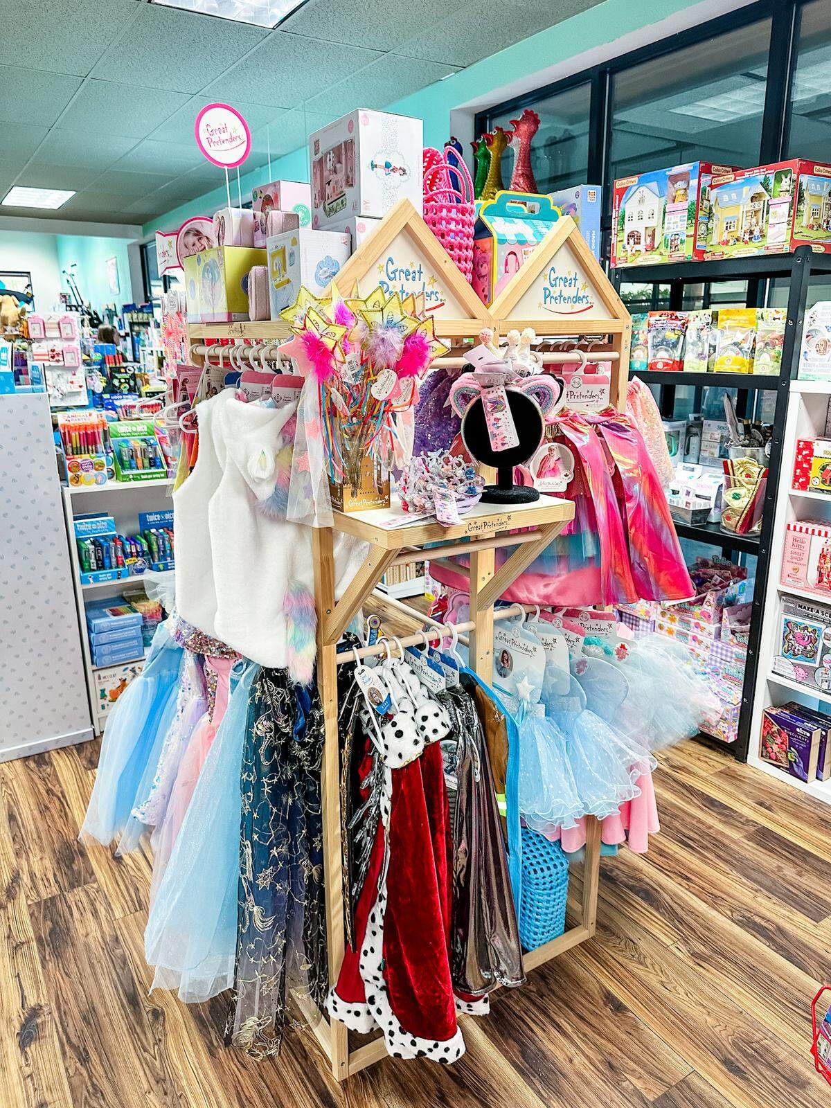 Dress-up costumes for little ones hang on display at The Curious Bear Toy & Book Shop in Fircrest, Wash.