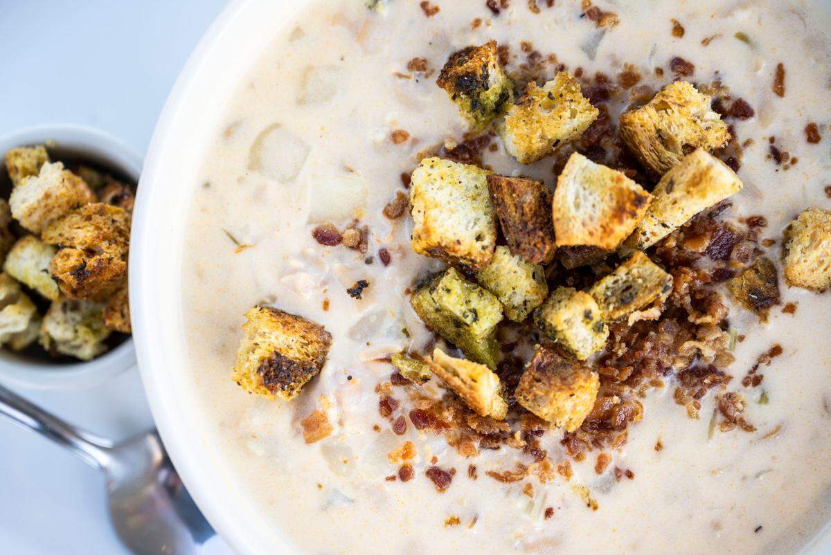 The Netshed clam chowder differs from most in that it’s thinner but still packed with clams, bacon, onion, potatoes and cream, served with housemade croutons.