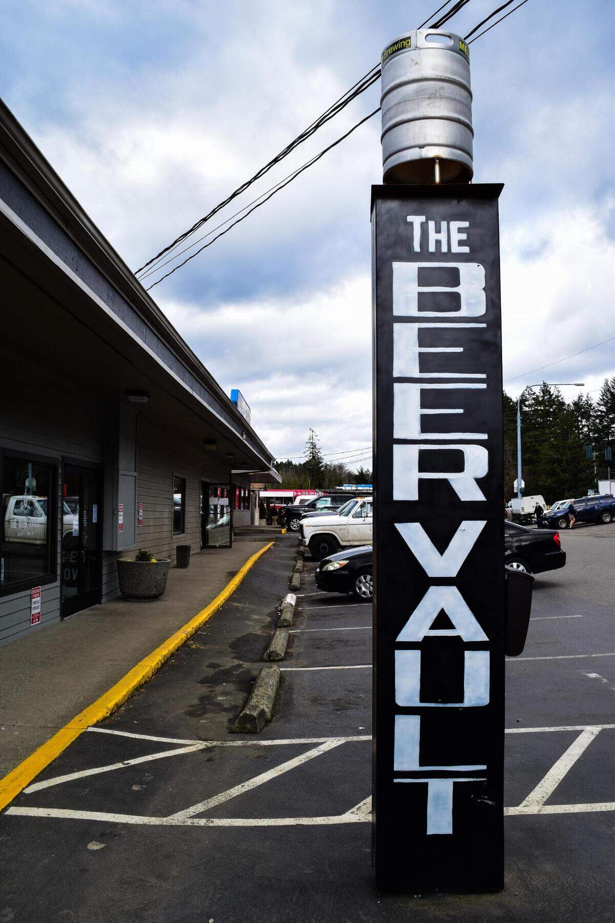 Look for this sign near the Purdy Bridge to find The Beer Vault, perhaps with the pup after a trip to Key Pen Parks’ 360 Trails, home to two great dog parks.