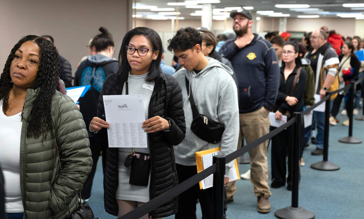 Haley Smith of Puyallup waits with other in-person voters at the Pierce County Annex in Tacoma, Washington, on Tuesday, Nov. 5, 2024.