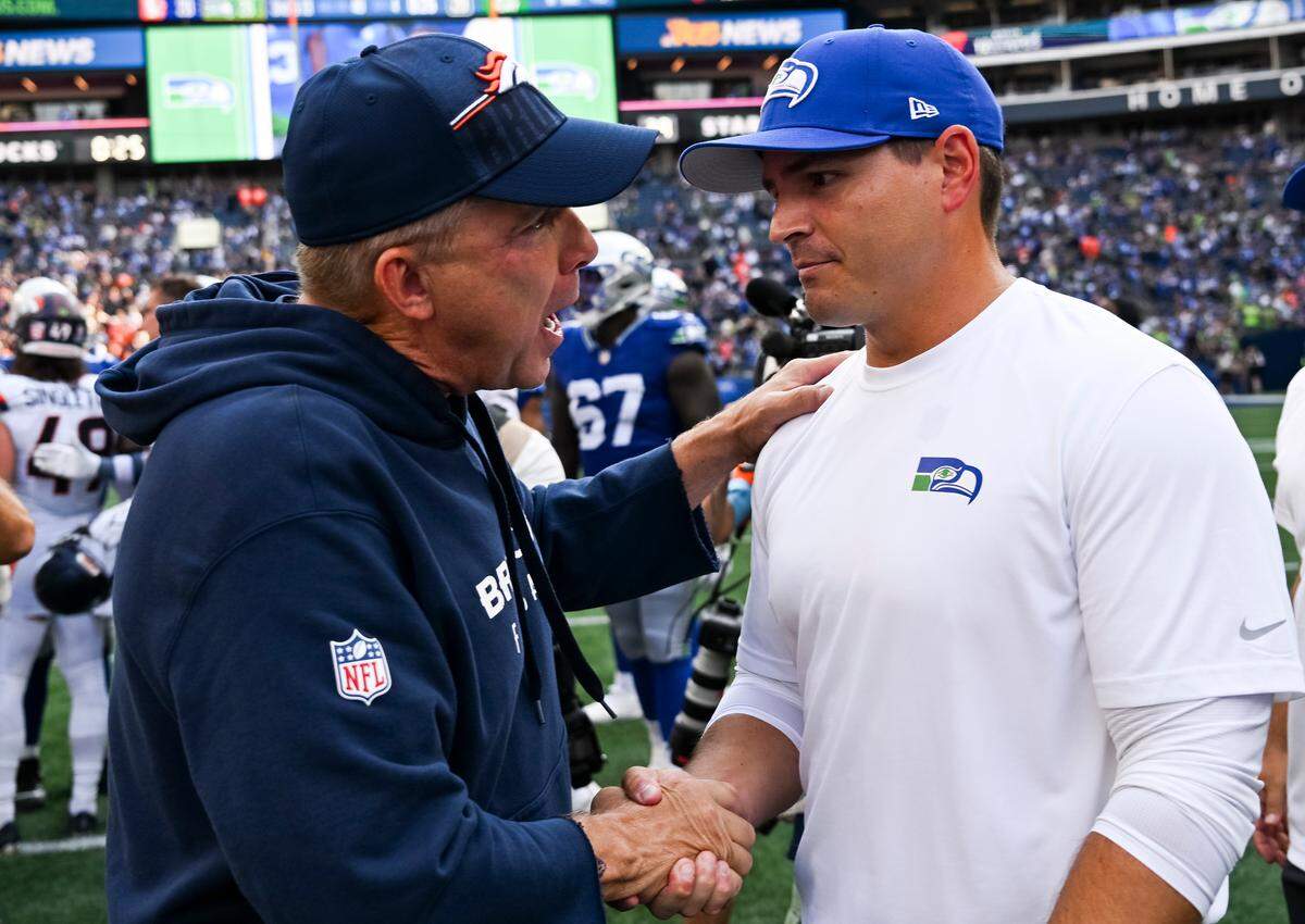 Denver Broncos head coach Sean Payton and Seattle Seahawks head coach Mike Macdonald shake hands after the Seattle Seahawks 26-20 victory against the Denver Broncos at Lumen Field, on Sunday, Sept. 8, 2024, in Seattle, Wash.