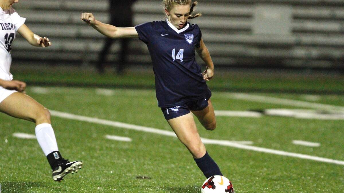 Gig Harbor junior forward Alyssa Grays winds up for a shot in Gig Harbor’s 3-1 win in the opening round of the Class 3A state tournament against West Seattle on Tuesday, Oct. 6, 2018.