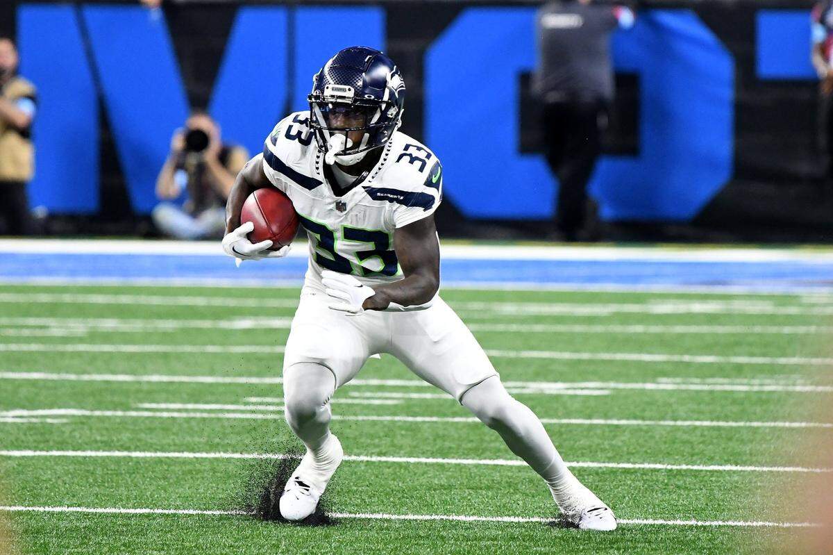 Seattle Seahawks cornerback Dee Williams (33) runs the ball against the Detroit Lions in the first quarter at Ford Field, in Detroit, Mich. Mandatory Credit: Eamon Horwedel-Imagn Images