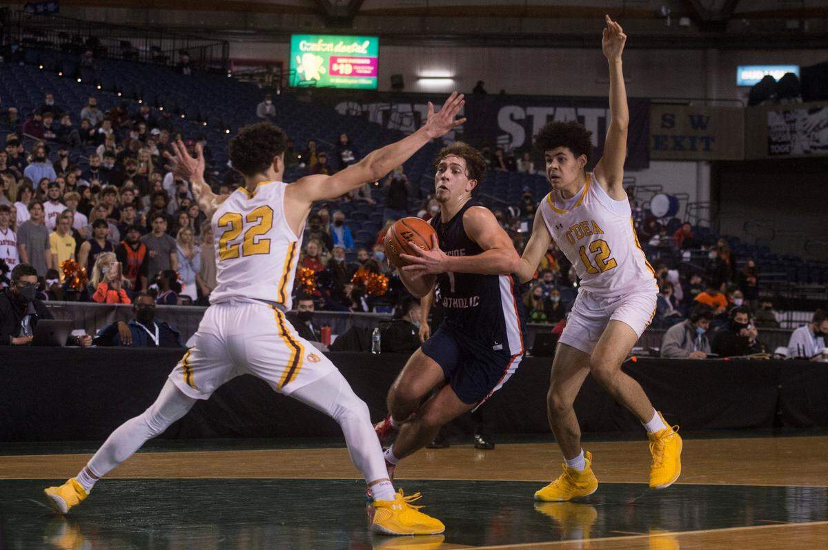 Eastside Catholic High School forward Louis Grante Halliday (1) drives to the hoop in the third quarter. Eastside Catholic beat O’Dea, 48-44, in a Class 3A state basketball first round game on Wednesday, March 2, 2022 at the Tacoma Dome in Tacoma, Wash.
