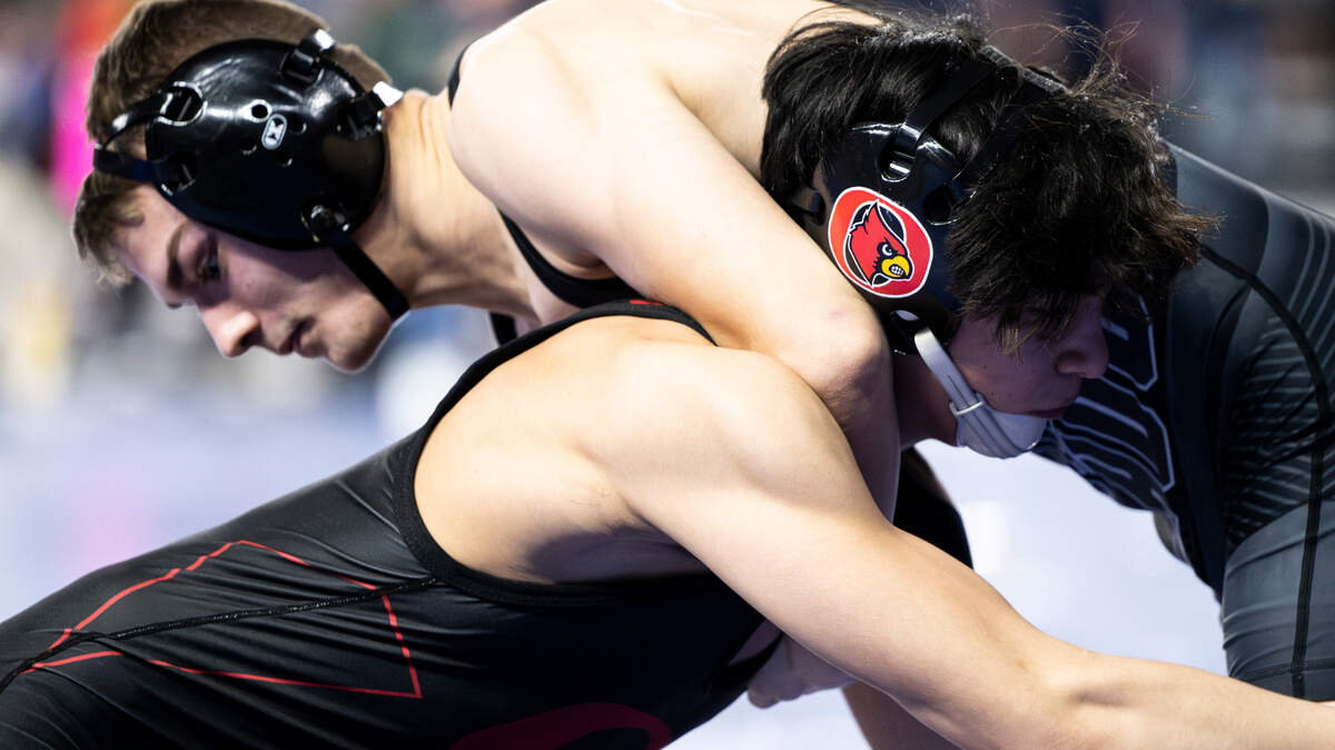 Orting’s Alan Salguero Jr. shoots for a single leg on Othello’s Mason Russell in the 2A 126-pound quarterfinal match during day one of the Mat Classic XXXV at the Tacoma Dome on Friday, Feb. 16, 2024, in Tacoma, Washington.